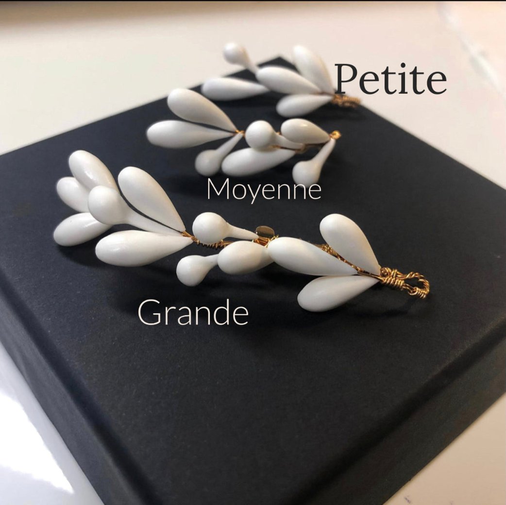 broche veste