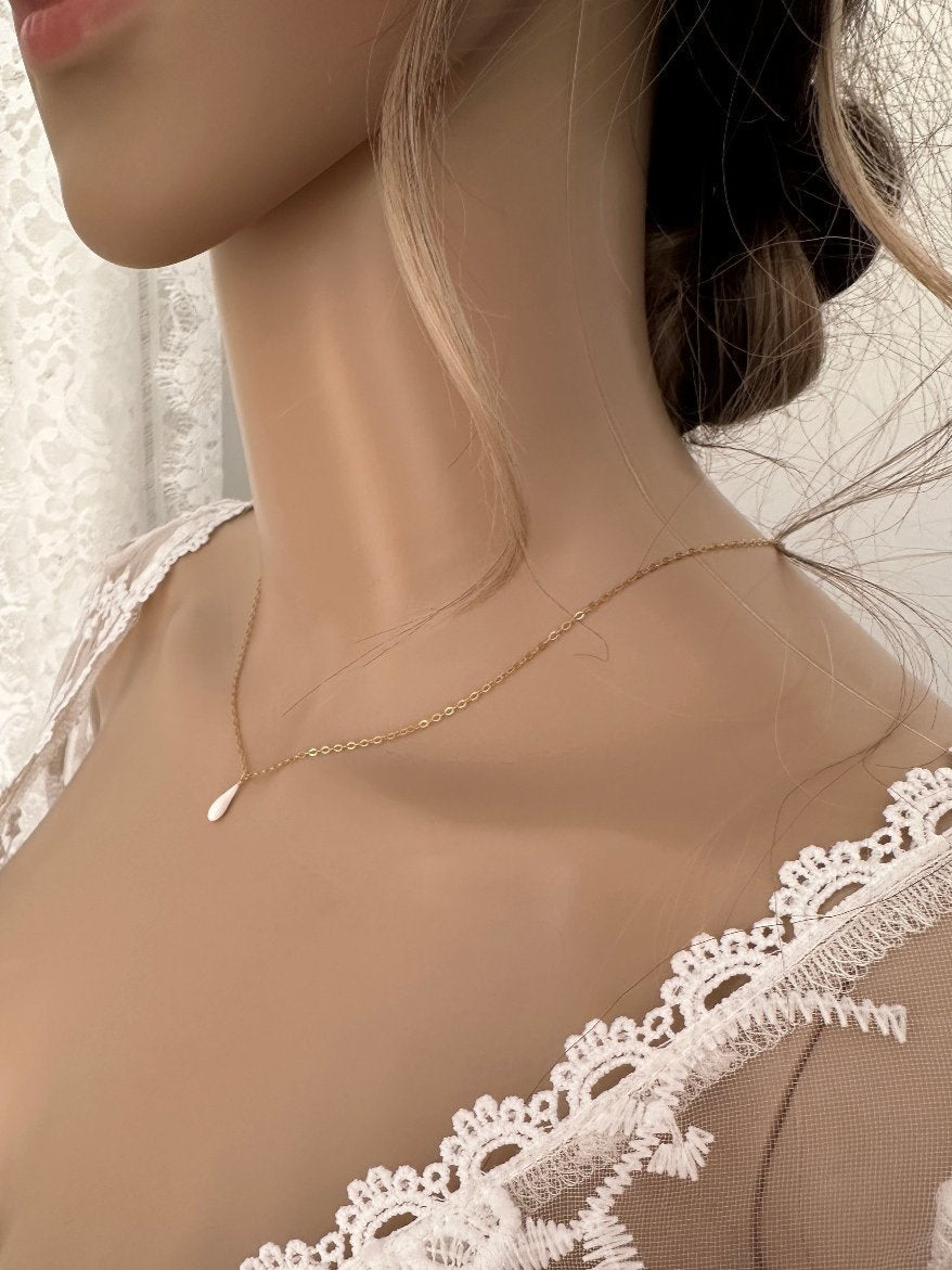collier blanc et or
